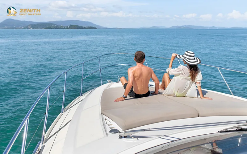 A-couple-relaxing-on-the-bow-of-a-yacht